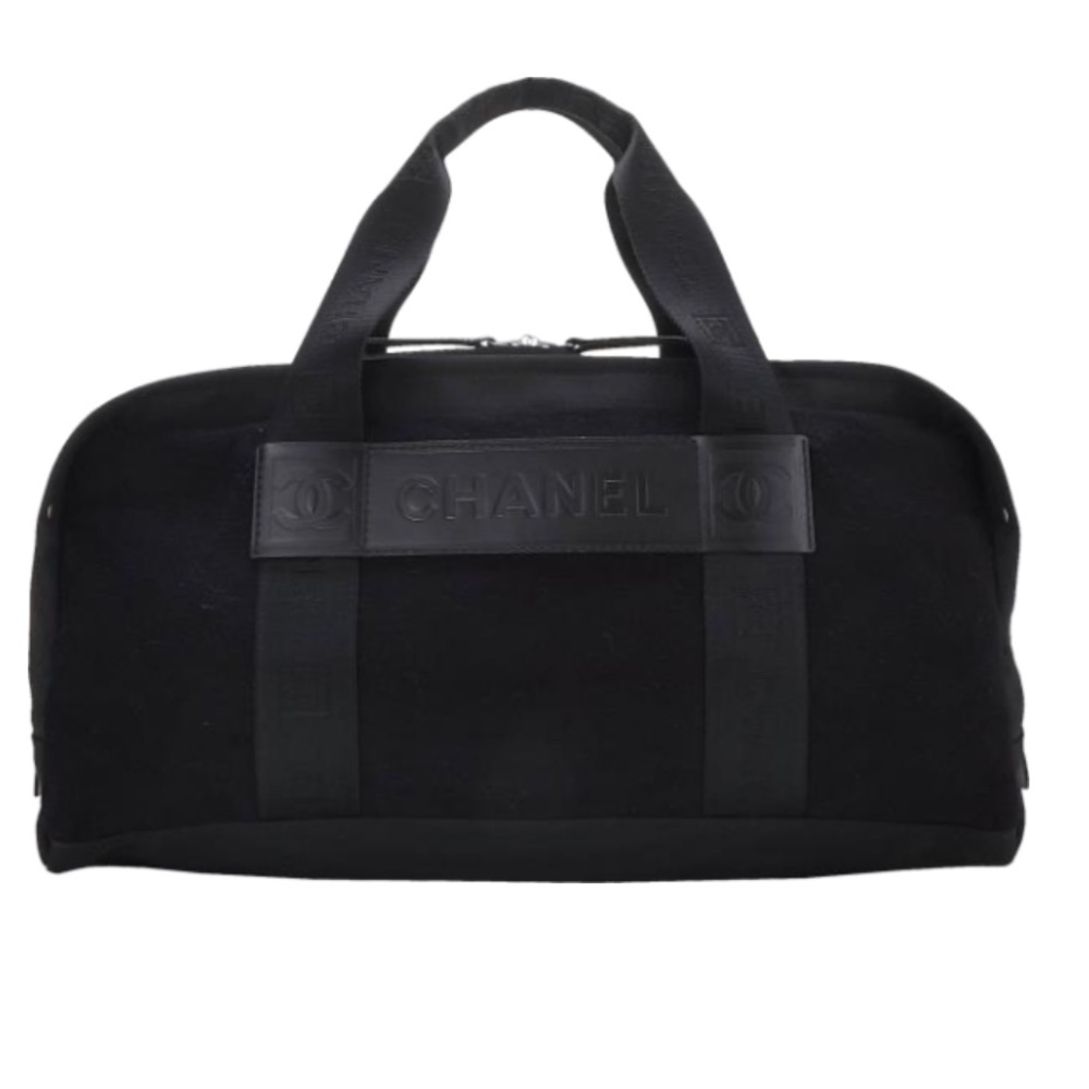 CHANEL black wool felt duffle bag. Perfect for travel!